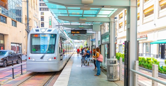 METRORail passengers stand on Central Station platform