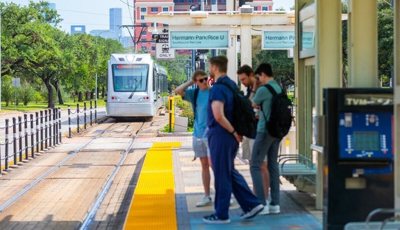 Passengers Wait on the Hermann Park Rice U Platform