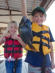 Boy and Girl with BIG sunfish