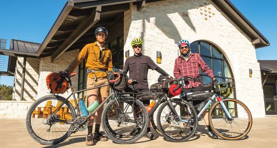 Men standing with their bikes