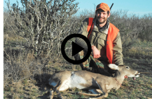 Hunter holding doe, video link