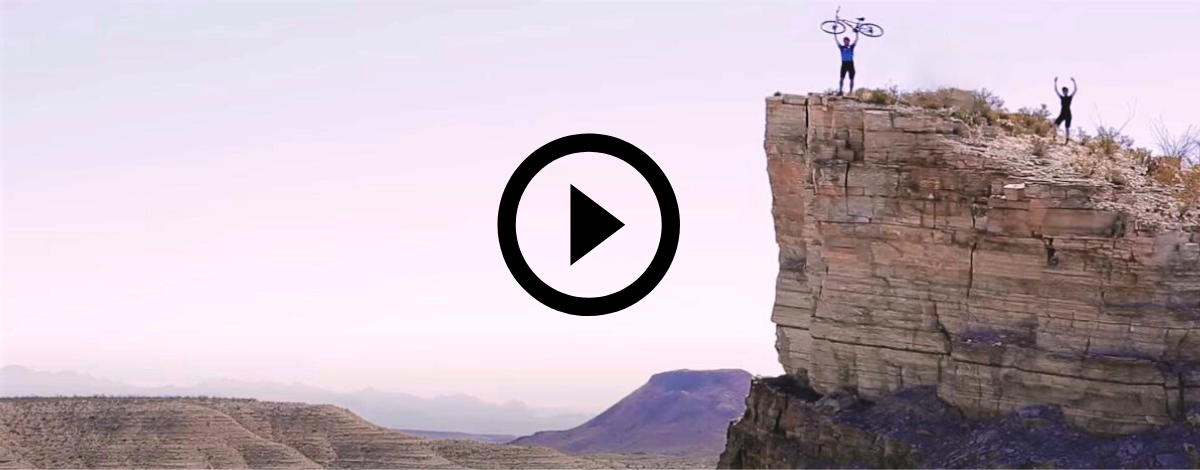 people on a cliff, with video link