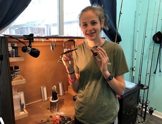Picture of Jayden in her lure workshop