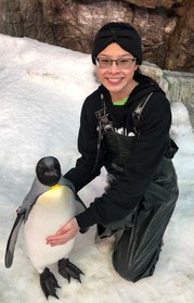 Picture of Stephanie Hendricks with a penquin