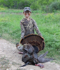 Small girl with large turkey