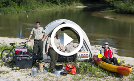 Texas Outdoor Family instructors by tent, video link