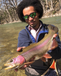 Man holding large rainbow trout