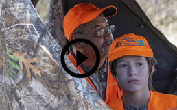 boy and man in deer blind, video link 
