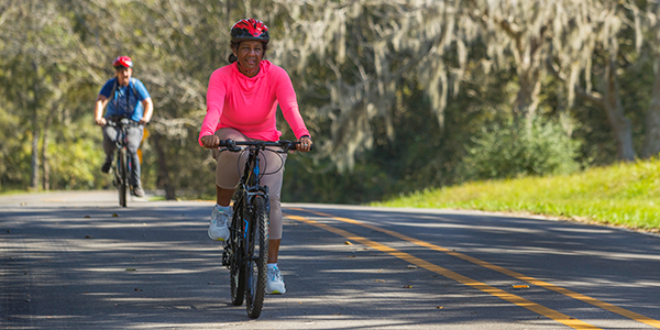 A woman riding a bicycle