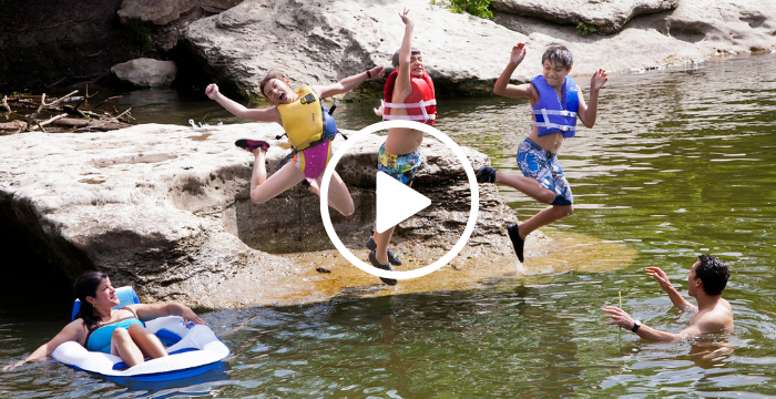 Swimmers leaping into Inks Lake, with video link