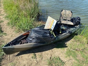 Picture of a kayak loaded with trash