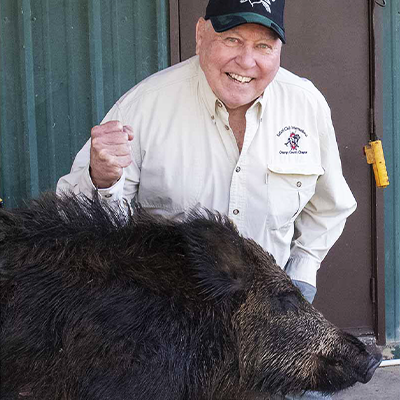 Wild Hog Adventure Winner with his harvest
