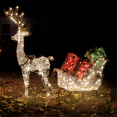 Image of a reindeer and sleigh made of holiday lights