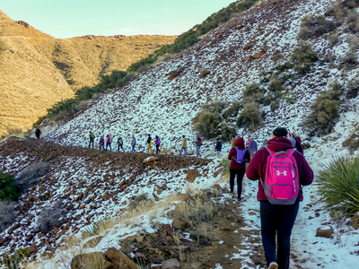 A group of people hiking at Franklin Mountain