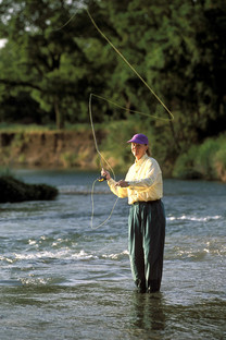 Picture of a woman casting a fly rod
