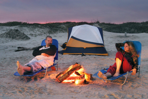 couple camping on a beach
