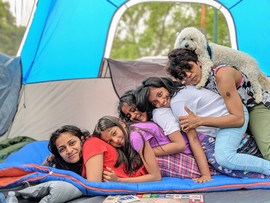 Family in a tent, the Winter Winner of State Parks Photo Contest 