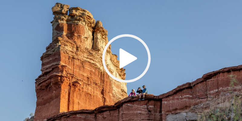 People sitting on ledge at Palo Duro, video link