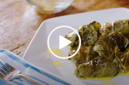 venison dolma stacked on a plate, video link