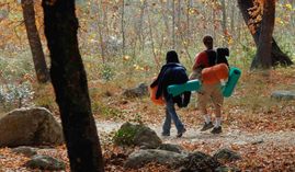 backpackers on trail in Lost Maples in fall