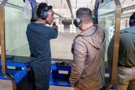 Image of two shooters at a range.