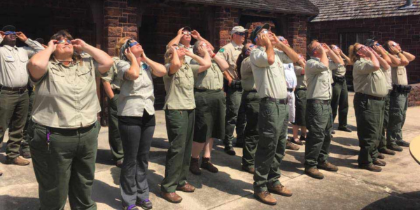 State Park staff viewing a solar eclipse.