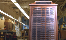 Time capsule, showing plaques of park names, in the shop