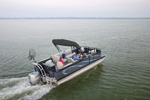 Family on a pontoon boat