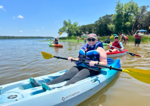 Kayaking 101 participants launch kayaks at Cleburne State Park