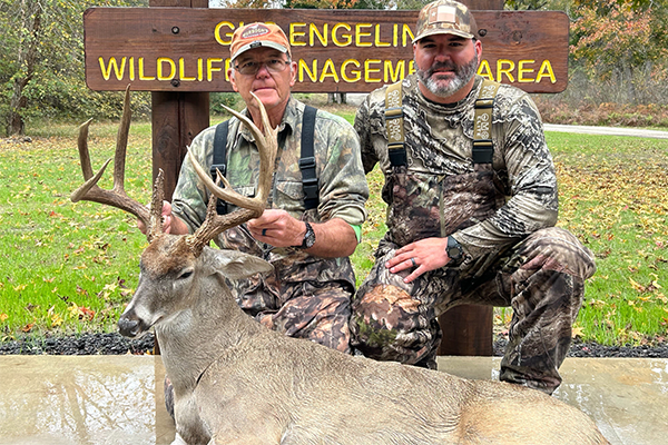 Whitetail Bonanza winner and his harvest.