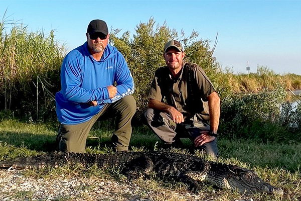Gator Hunt winner with his harvest.