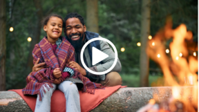 Dad and daughter enjoying campfire, with video link 