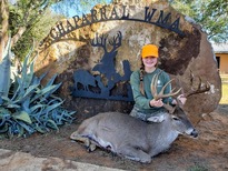 Girl with buck harvest at Chaparral WMA