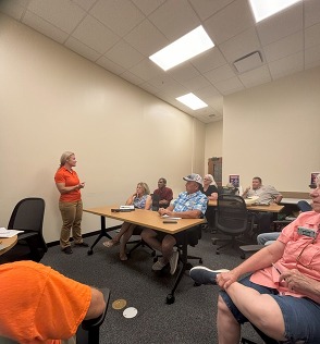Area chief meeting in classroom at Bass Pro