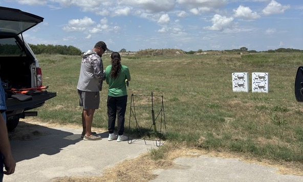 Instructor candidates shoot at range