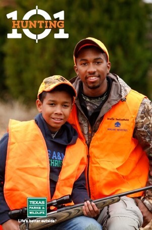Father and son in hunting gear
