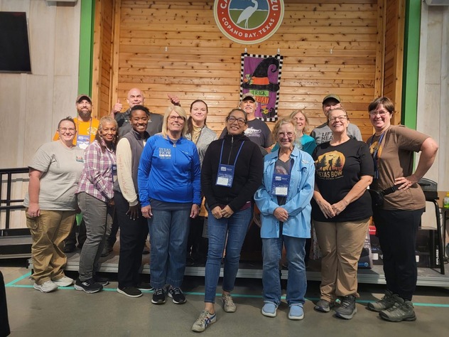 Women on stage receiving prize