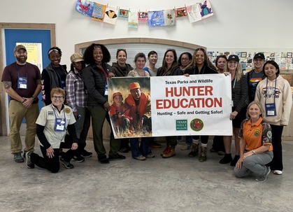 Class picture of all women's hunter ed class