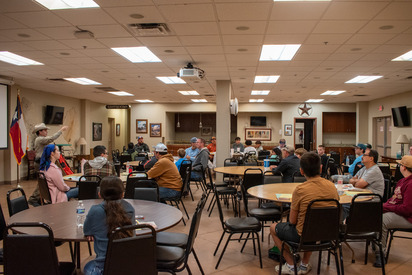 Game Warden talking to Hunter Ed class