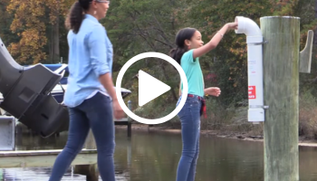 Girl placing used fishing line in public container, video link