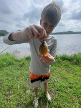 Picture of a boy catching a fish