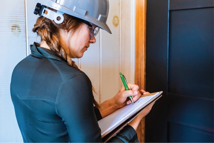 Inspector using a clipboard