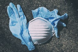 mask and rubber gloves litter