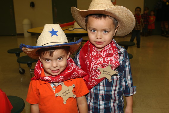Two young students dressed for San Jacinto Day