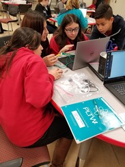Sheldon ISD PK-12 STEM students at a laptop on a table