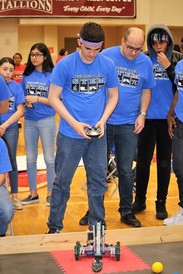 Sheldon ISD PK-STEM students with robotic and remote control at event