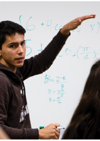 HS male student at whiteboard