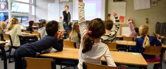 raised hands in classroom