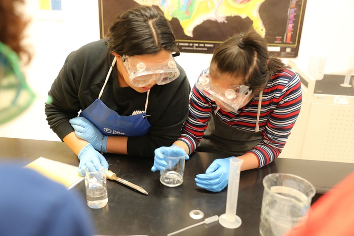 Two students in a science lab
