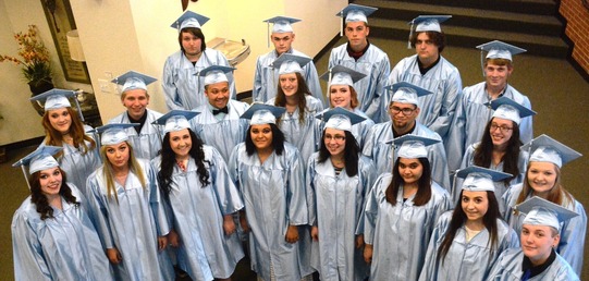 Group of graduating students in caps and gowns